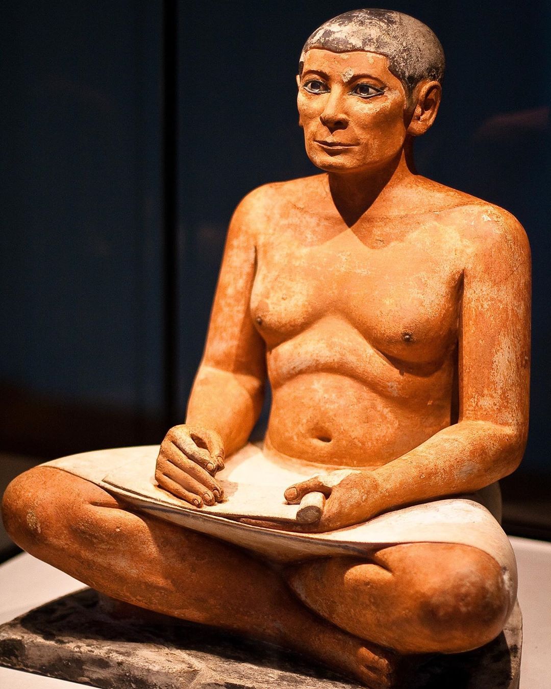 sitting scribe